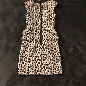 Black and white leopard dress with peplum accent